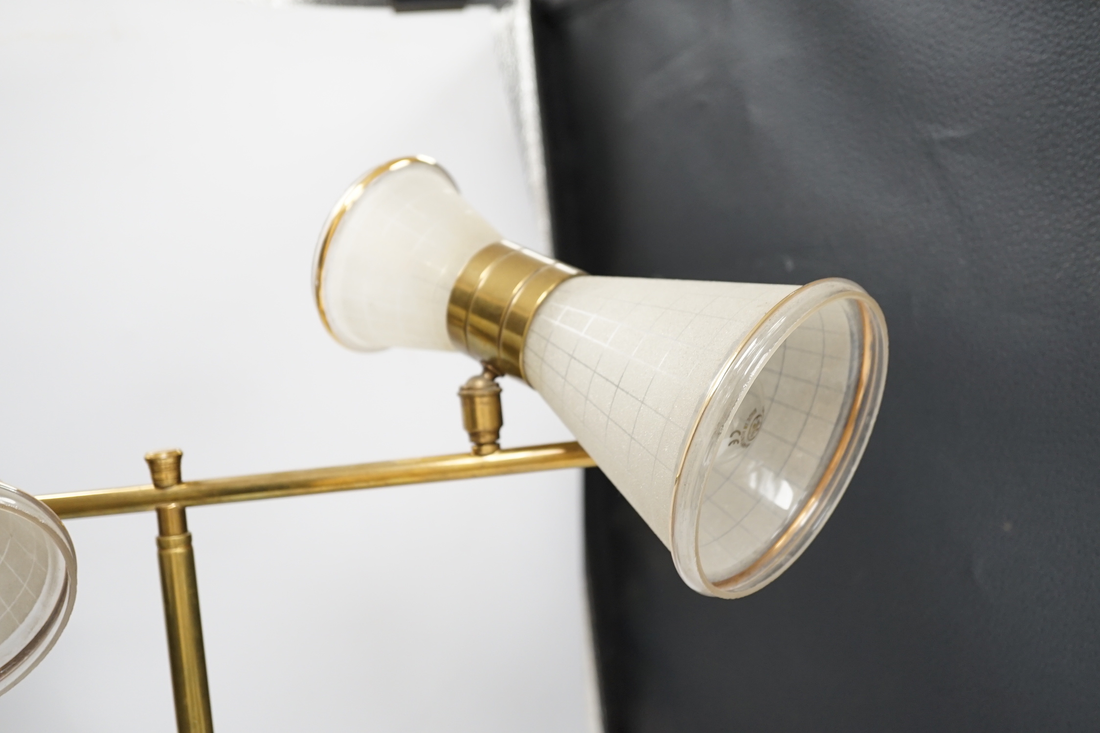 A brass and glass make-up artist's light, 56cm